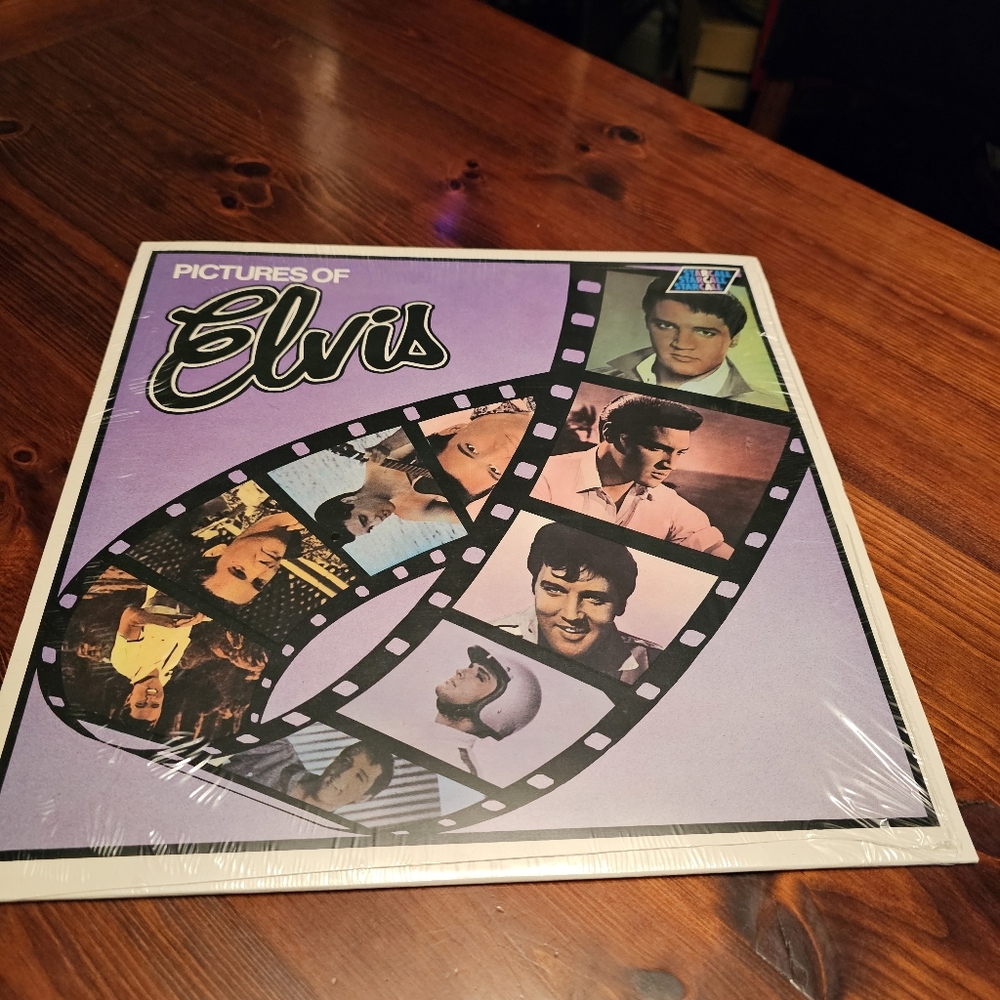Elvis‎ Presley- Pictures vinyl record in near mint condition